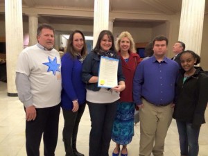 Nikol and other colorectal cancer advocates with March 2015 proclamation