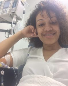 Survivor Monica Rosario getting chemo.