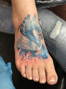 kelly morrow tattoo grace swan blue ribbon