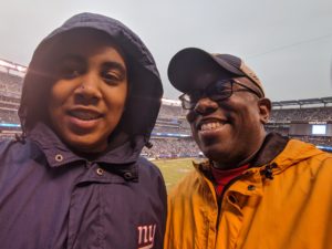 Rodnell and son at Giants game