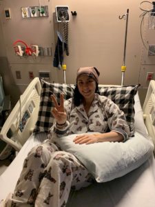 Alexa in hospital bed.