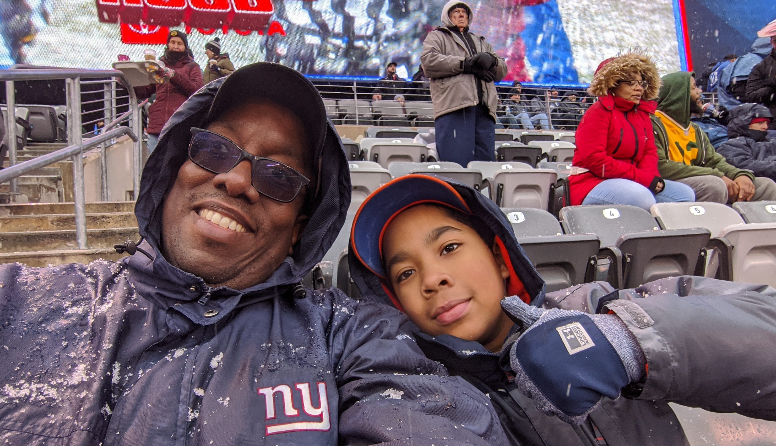 Rodnell and son at Giants game