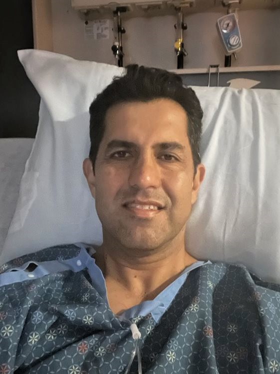 Esteban in the hospital after surgery 