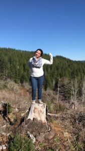 Amber flexing on a hike.