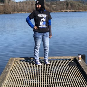 Amber posing by lake.